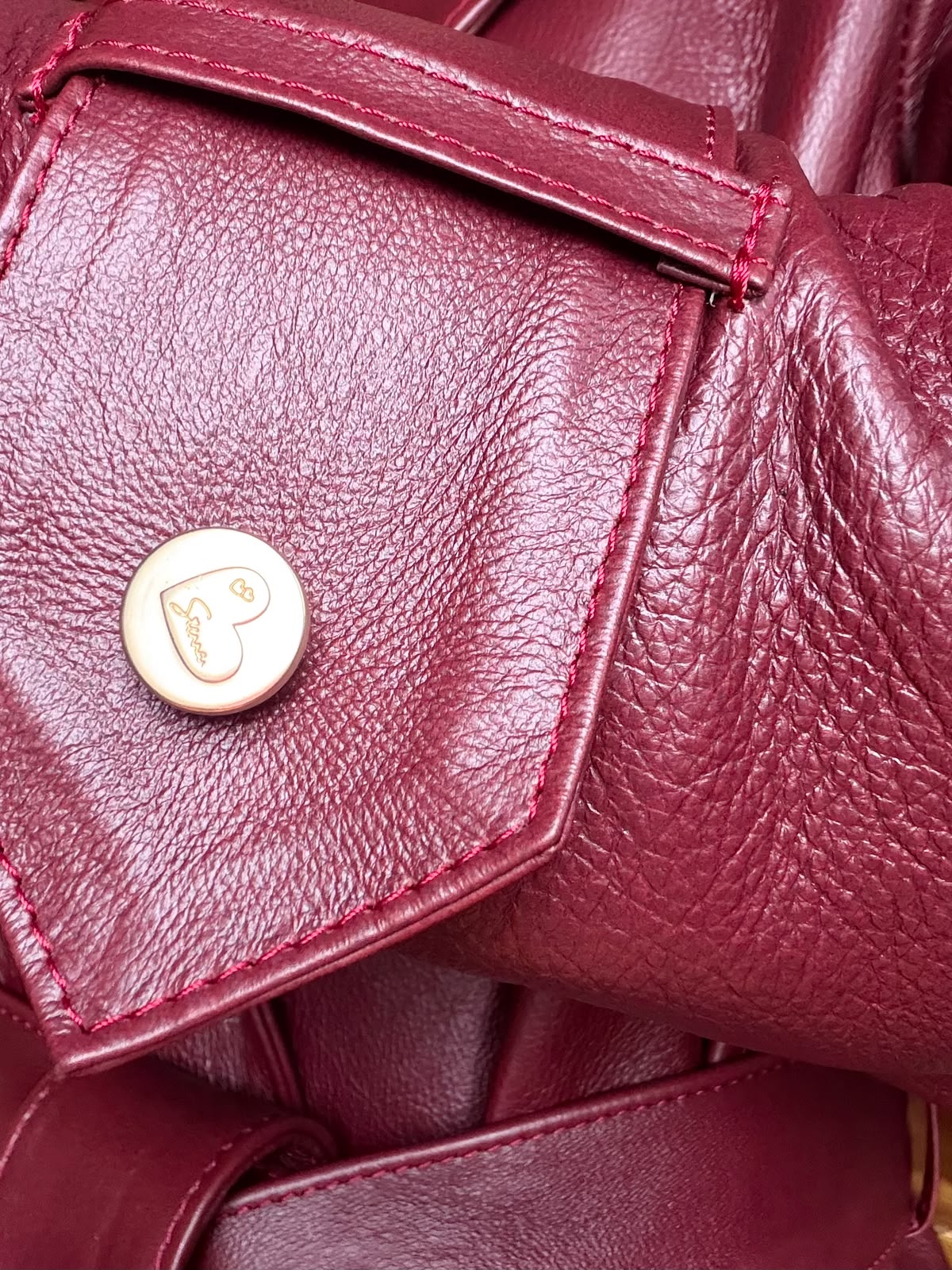 Maroon leather coat